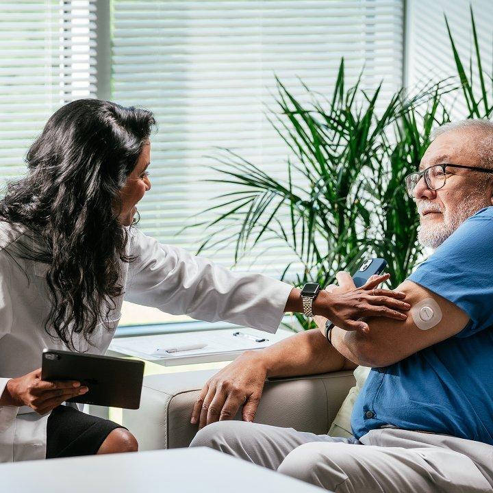 Dexcom G7 user talking with a doctor